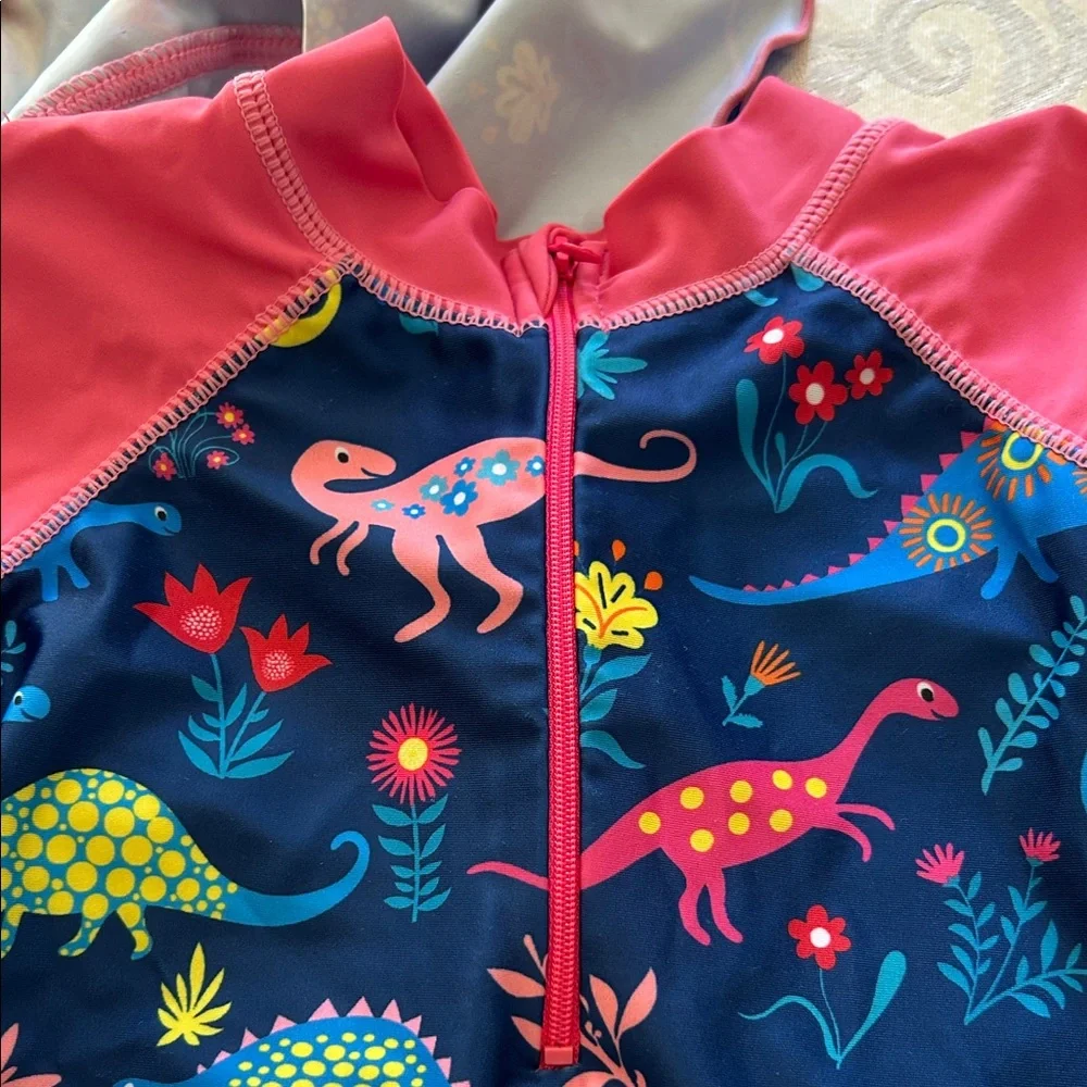 Kids One-Piece Rash Guard Swimsuit in Navy & Pink with Dino Print